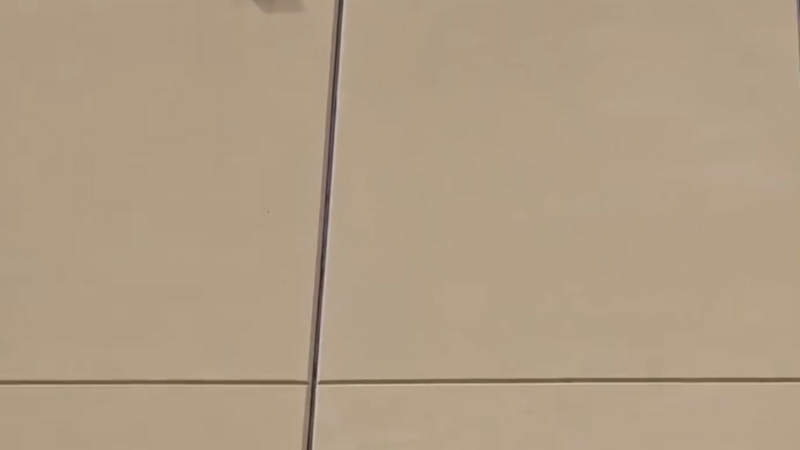 Close-up of our precise caulking work at Walmart, where we replaced sealant on exterior control joints, windows, and doors to ensure long-lasting durability and protection