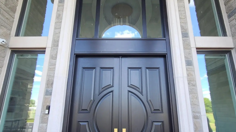 First Choice Caulking enhanced the grand entrance of this luxury home by expertly sealing around the door, ensuring a seamless finish and lasting protection.