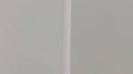 Neat and precise caulking applied in the corner of the interior wall, providing a smooth, professional finish and enhancing the overall aesthetic while preventing gaps and air leakage. This ensures a clean, sterile environment, making it ideal for medical facilities where hygiene and safety are paramount.